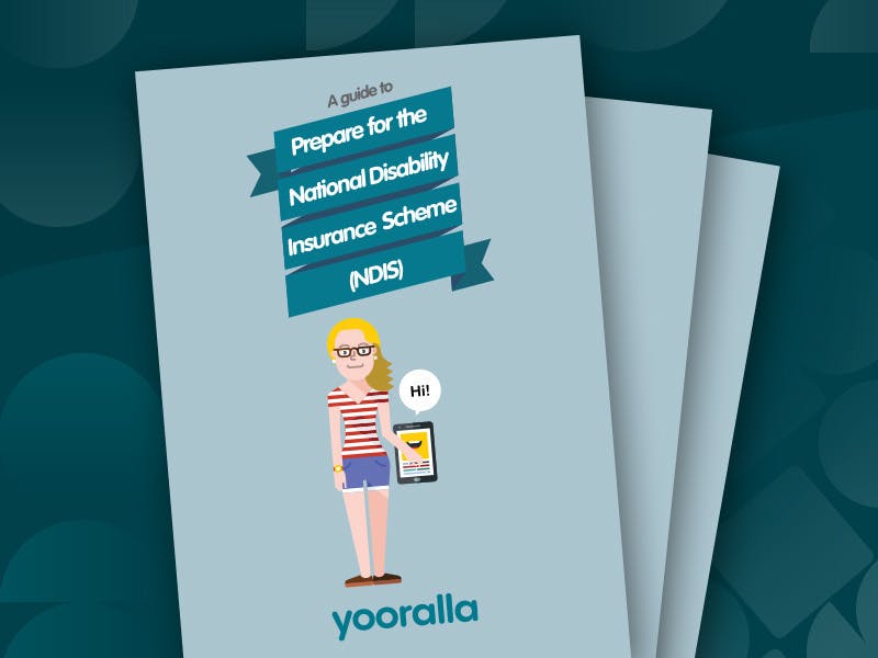 IMAGE DESCRIPTION: copies of Yooralla's Guide to prepare for the national Disability Insurance scheme are displayed